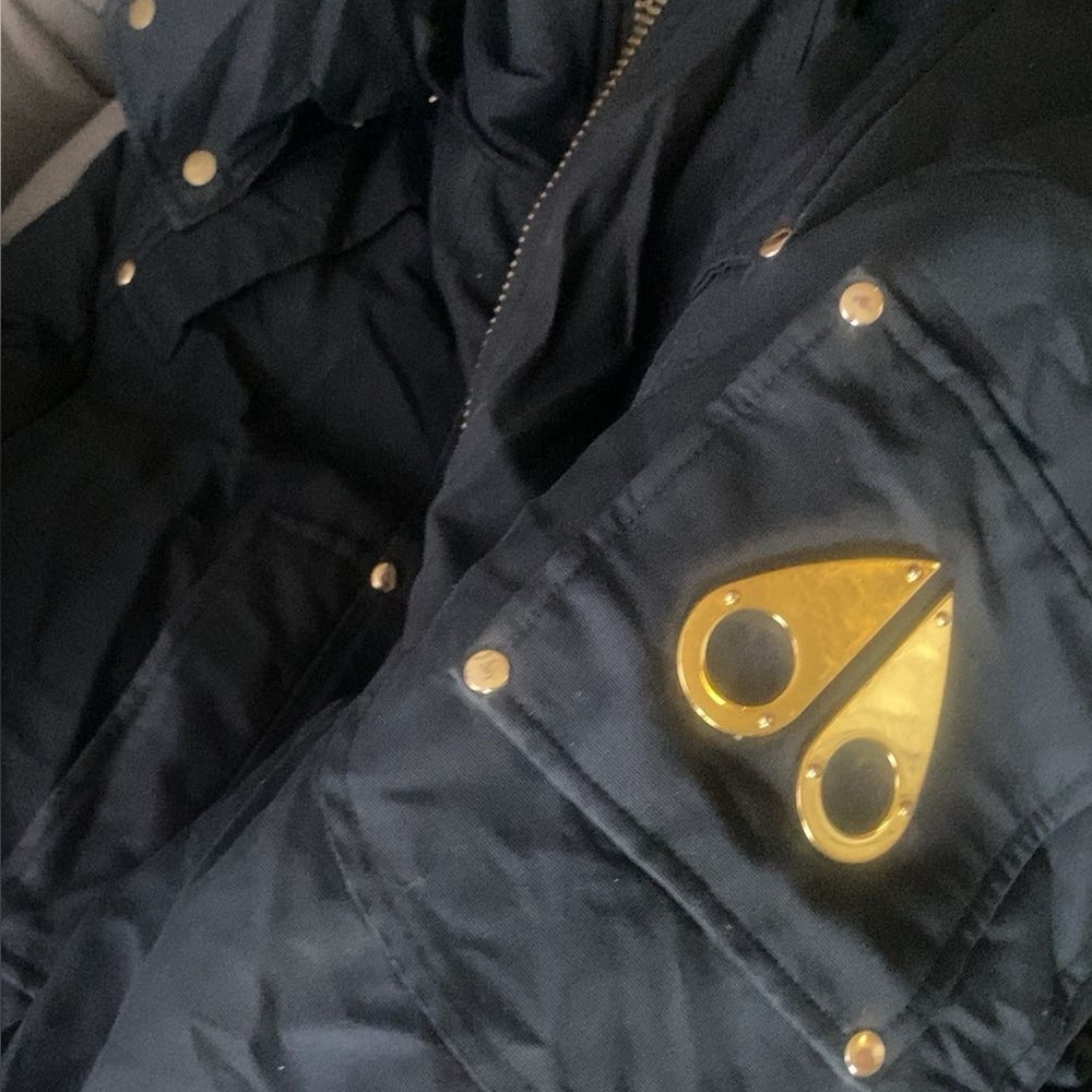 Moose Knuckles Black Puffer Jacket with Gold Details